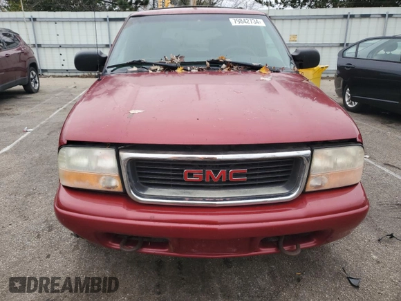 1999 GMC Jimmy SLE z VIN 1GKDT13W3X2546163, wystawiony jako Copart lot #79842734 z przebiegiem 144 800 mil mil oraz Szkoda całkowita • Salvage title. Historia ofert i sprzedaży dostępna na DreamBid. Obrazek 5.