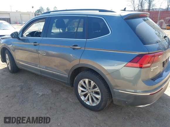 2018 Volkswagen Tiguan SEL with VIN 3VV3B7AX6JM001231, listed as a IAAI auction lot 41781659 with 137,930 mi miles and . Bid and sale history available at DreamBid. Image 3.