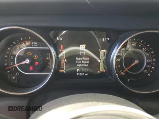 2022 Jeep Wrangler Unlimited Sahara Altitude with VIN 1C4HJXEG9NW191002, listed as a Copart auction lot 58635414 with 21,301 mi miles and Salvage title. Bid and sale history available at DreamBid. Image 9.