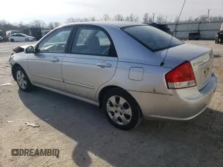 2009 Kia Spectra LX with VIN KNAFE221895659552, listed as a Copart auction lot 82555924 with 114,704 mi miles and Salvage Title. Bid and sale history available at carsss.com. Image 2.
