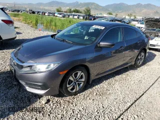 2017 Honda Civic LX with VIN 19XFC2F5XHE007265, listed as a Copart auction lot 58787935 with 84,642 mi miles and Salvage title. Bid and sale history available at DreamBid. Image 1.