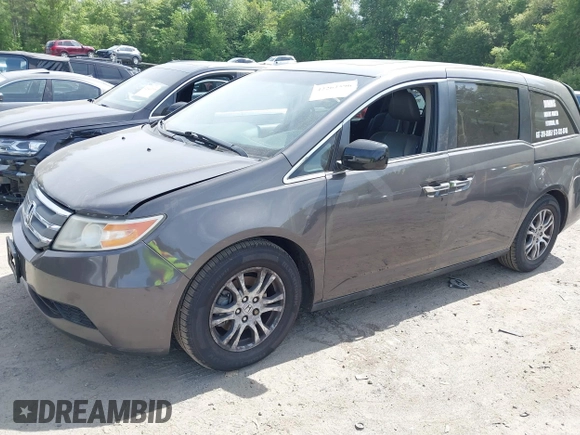 2012 Honda Odyssey EX-L with VIN 5FNRL5H63CB037697, listed as a IAAI auction lot 42262596 with 135,218 mi miles and . Bid and sale history available at DreamBid. Image 17.