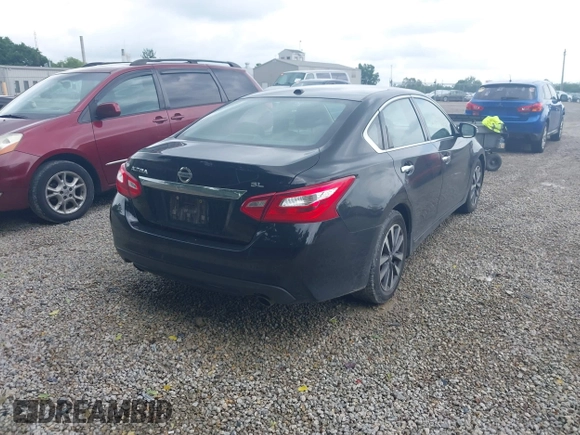 2017 Nissan Altima SV with VIN 1N4AL3APXHC165109, listed as a IAAI auction lot 42447225 with 202,185 mi miles and . Bid and sale history available at DreamBid. Image 4.