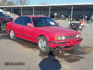 1991 BMW 5 Series z VIN WBSHD9313MBK06030, wystawiony jako IAAI lot #41856669 z przebiegiem 184 968 mil mil oraz . Historia ofert i sprzedaży dostępna na DreamBid. Obrazek 1.