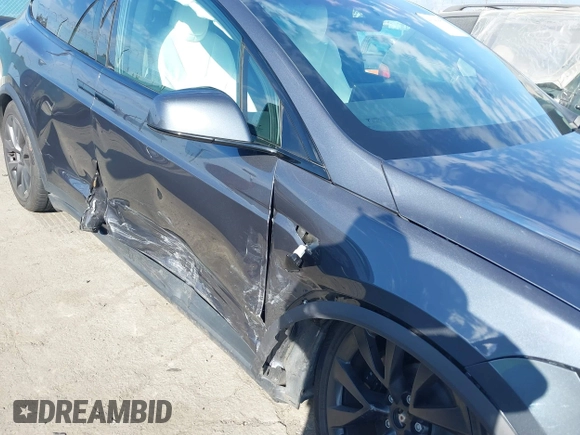2023 Tesla Model X with VIN 7SAXCBE50PF378548, listed as a IAAI auction lot 41698357 with Not Provided miles and . Bid and sale history available at DreamBid. Image 6.