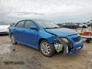 2010 Toyota Corolla with VIN 2T1BU4EE5AC498504, listed as a Copart auction lot 57043515 with 128,651 mi miles and Salvage title. Bid and sale history available at DreamBid. Image 4.