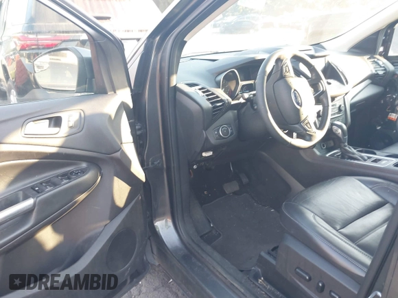 2018 Ford Escape SEL with VIN 1FMCU9HD0JUC25036, listed as a IAAI auction lot 40518589 with 143,076 mi miles. Bid and sale history available at carsss.com. Image 5.