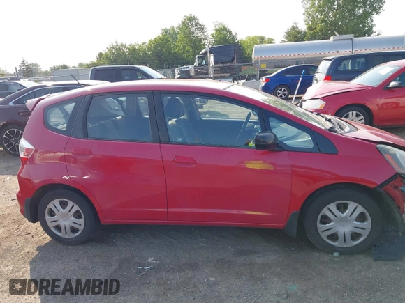 2009 Honda Fit z VIN JHMGE88219S023503, wystawiony jako IAAI lot #42376165 z przebiegiem 142 166 mil mil oraz . Historia ofert i sprzedaży dostępna na DreamBid. Obrazek 14.