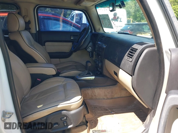 2007 Hummer H3 SUV with VIN 5GTDN13E978105558, listed as a IAAI auction lot 42175911 with 126,439 mi miles and . Bid and sale history available at DreamBid. Image 5.