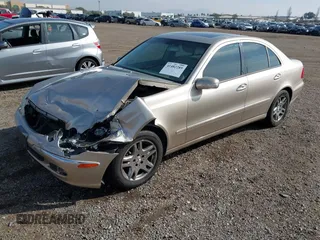 2005 Mercedes-Benz E-Class 3.2L with VIN WDBUF65J05A706096, listed as a IAAI auction lot 41482289 with 110,531 mi miles. Bid and sale history available at carsss.com. Image 2.