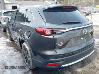 2016 Mazda CX-9 Grand Touring with VIN JM3TCBDY3G0109201, listed as a IAAI auction lot 41705355 with 92,657 mi miles and . Bid and sale history available at carsss.com. Image 3.