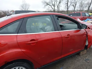 2018 Ford Focus Titanium with VIN 1FADP3J20JL280698, listed as a IAAI auction lot 41823530 with 54,841 mi miles and . Bid and sale history available at DreamBid. Image 13.