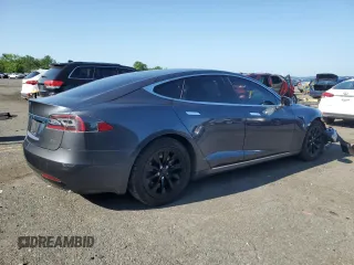 2017 Tesla Model S 100D с VIN 5YJSA1E2XHF185516, выставлен на аукционе Copart как лот 61816135 с пробегом 132 267 миль миль и Списание • Salvage title. История ставок и продаж доступна на DreamBid. Изображение 3.