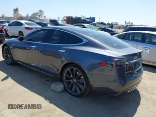 2014 Tesla Model S 60 с VIN 5YJSA1H15EFP65285, выставлен на аукционе IAAI как лот 42297394 с пробегом 178 866 миль миль и . История ставок и продаж доступна на DreamBid. Изображение 3.