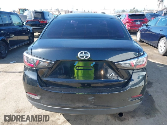 2016 Scion iA z VIN 3MYDLBZV4GY140248, wystawiony jako IAAI lot #42282531 z przebiegiem 72 644 mil mil oraz . Historia ofert i sprzedaży dostępna na DreamBid. Obrazek 16.