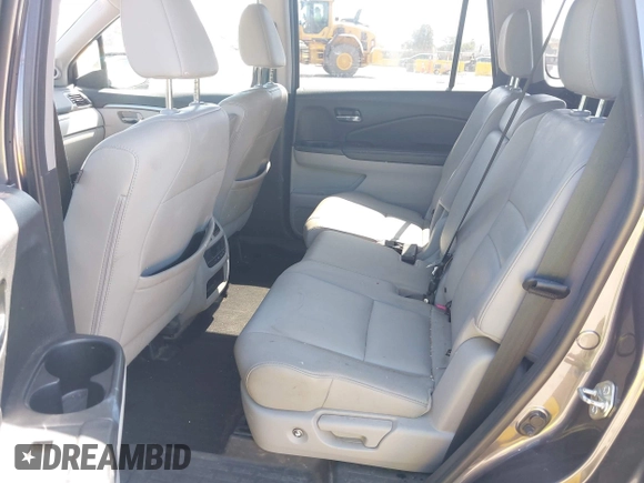 2017 Honda Pilot EX-L with VIN 5FNYF6H59HB032480, listed as a IAAI auction lot 42488789 with 112,595 mi miles and . Bid and sale history available at DreamBid. Image 8.