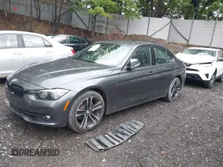 2018 BMW 3 Series 330i xDrive with VIN WBA8D9C58JEM34493, listed as a IAAI auction lot 42309425 with 58,868 mi miles and . Bid and sale history available at DreamBid. Image 2.
