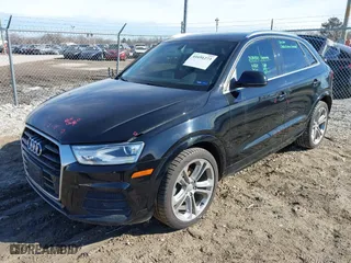 2016 Audi Q3 Premium Plus with VIN WA1EFCFS1GR011801, listed as a IAAI auction lot 41691273 with 126,554 mi miles. Bid and sale history available at carsss.com. Image 2.