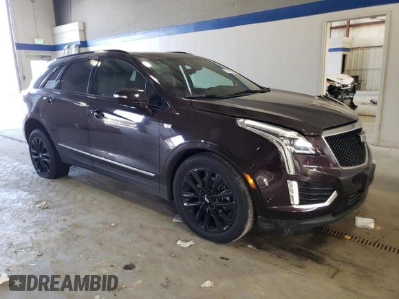 2021 Cadillac XT5 AWD Sport z VIN 1GYKNGRS5MZ165836, wystawiony jako Copart lot #77872264 z przebiegiem 46 065 mil mil oraz Szkoda całkowita • Salvage title. Historia ofert i sprzedaży dostępna na DreamBid. Obrazek 4.