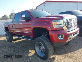 2018 GMC Sierra 2500HD Denali z VIN 1GT12UEY6JF272619, wystawiony jako IAAI lot #41743216 z przebiegiem 165 231 mil mil oraz . Historia ofert i sprzedaży dostępna na DreamBid. Obrazek 1.