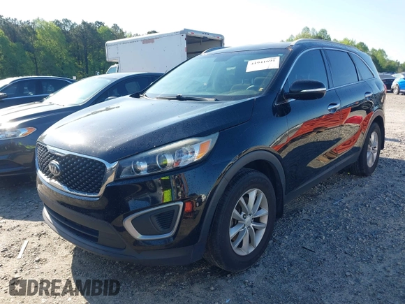 2016 Kia Sorento LX with VIN 5XYPG4A36GG170121, listed as a IAAI auction lot 41941691 with 240,609 mi miles and . Bid and sale history available at carsss.com. Image 2.