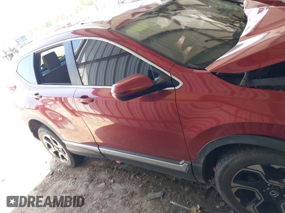 2018 Honda CR-V Touring with VIN 2HKRW2H92JH659660, listed as a IAAI auction lot 42266819 with 11 mi miles and . Bid and sale history available at DreamBid. Image 13.