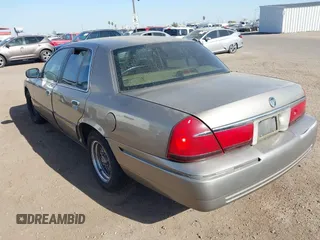 2002 Mercury Grand Marquis LS Premium z VIN 2MEFM75W32X636872, wystawiony jako IAAI lot #41717410 z przebiegiem 88 840 mil mil oraz . Historia ofert i sprzedaży dostępna na DreamBid. Obrazek 3.