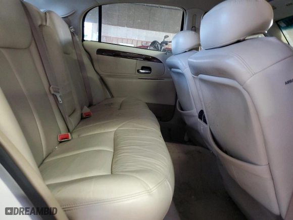 2002 Lincoln Town Car Cartier with VIN 1LNHM83W22Y662670, listed as a Copart auction lot 83526144 with 75,072 mi miles and Salvage Title. Bid and sale history available at carsss.com. Image 10.