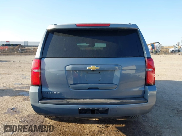 2016 Chevrolet Tahoe LT z VIN 1GNSCBKC3GR214982, wystawiony jako IAAI lot #41991198 z przebiegiem 176 422 mil mil oraz . Historia ofert i sprzedaży dostępna na DreamBid. Obrazek 16.