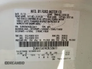 2012 Lincoln MKT EcoBoost with VIN 2LMHJ5AT4CBL53611, listed as a Copart auction lot 46493425 with 77,072 mi miles and Salvage Title. Bid and sale history available at DreamBid. Image 14.