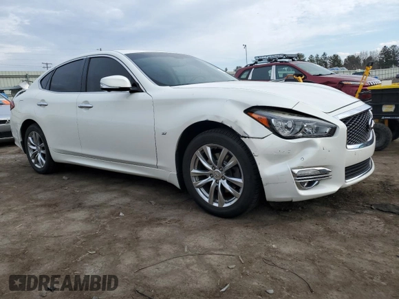 2015 Infiniti Q70 with VIN JN1BY1AR0FM561260, listed as a Copart auction lot 46496955 with 69,792 mi miles and Salvage title. Bid and sale history available at DreamBid. Image 4.