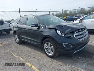 2015 Ford Edge SEL with VIN 2FMTK4J88FBB05259, listed as a IAAI auction lot 42043247 with 128,987 mi miles. Bid and sale history available at carsss.com. Image 1.