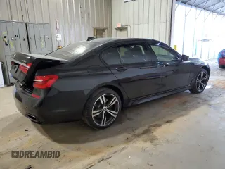 2016 BMW 7 Series 750i with VIN WBA7F0C5XGGL99017, listed as a Copart auction lot 84934504 with 0 mi miles and Salvage Title. Bid and sale history available at carsss.com. Image 3.