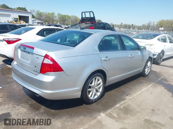 2012 Ford Fusion SEL with VIN 3FAHP0JG6CR418390, listed as a IAAI auction lot 41900696 with 148,424 mi miles. Bid and sale history available at carsss.com. Image 4.