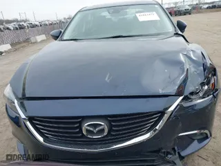 2016 Mazda Mazda6 i Grand Touring with VIN JM1GJ1W57G1486962, listed as a IAAI auction lot 41813471 with 64,078 mi miles. Bid and sale history available at carsss.com. Image 12.