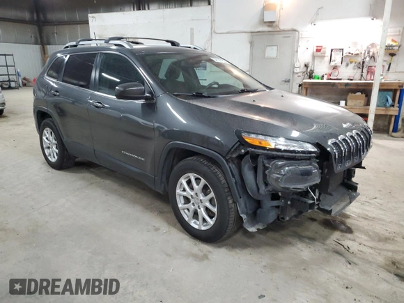 2015 Jeep Cherokee Latitude with VIN 1C4PJMCS0FW787988, listed as a Copart auction lot 52105155 with 117,254 mi miles and Salvage Title. Bid and sale history available at DreamBid. Image 4.