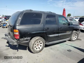 2001 GMC Yukon SLT with VIN 1GKEC13T31J198419, listed as a Copart auction lot 65012144 with 210,431 mi miles and Salvage Title. Bid and sale history available at carsss.com. Image 3.