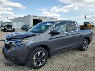 2020 Honda Ridgeline RTL with VIN 5FPYK3F5XLB017323, listed as a Copart auction lot 58368395 with 117,058 mi miles and Salvage title. Bid and sale history available at DreamBid. Image 1.