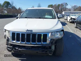 2012 Jeep Grand Cherokee Laredo with VIN 1C4RJFAT4CC229204, listed as a IAAI auction lot 41659491 with 141,143 mi miles. Bid and sale history available at carsss.com. Image 12.