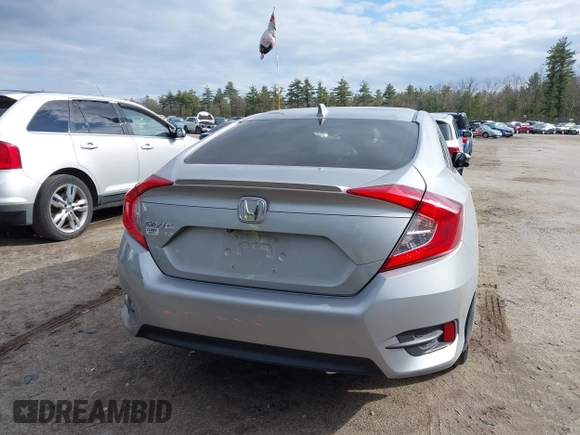 2018 Honda Civic EX-T z VIN 2HGFC1F34JH641837, wystawiony jako IAAI lot #41858089 z przebiegiem 65 318 mil mil oraz . Historia ofert i sprzedaży dostępna na DreamBid. Obrazek 16.