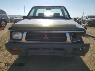 1994 Mitsubishi Mighty Max z VIN JA7LS21G4RP009588, wystawiony jako Copart lot #60519834 z przebiegiem 123 918 mil mil oraz Szkody całkowita. Historia ofert i sprzedaży dostępna na DreamBid. Obrazek 5.