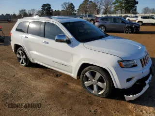 2014 Jeep Grand Cherokee Overland with VIN 1C4RJECGXEC529438, listed as a Copart auction lot 45693285 with 154,674 mi miles and Salvage Title. Bid and sale history available at carsss.com. Image 4.