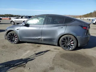 2022 Tesla Model Y Performance z VIN 7SAYGDEF5NF338301, wystawiony jako Copart lot #78189114 z przebiegiem 55 881 mil mil oraz Szkody całkowita. Historia ofert i sprzedaży dostępna na DreamBid. Obrazek 2.