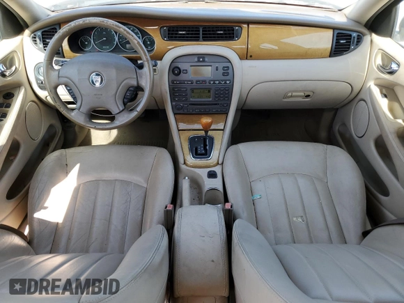 2003 Jaguar X-Type 2.5L Manual z VIN SAJEA51D73XD21289, wystawiony jako Copart lot #59583194 z przebiegiem 70 333 mil mil oraz Czysty tytuł • Clean title. Historia ofert i sprzedaży dostępna na DreamBid. Obrazek 8.