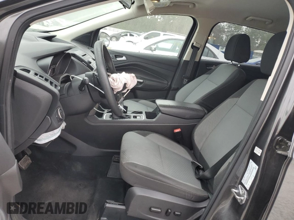 2017 Ford Escape SE with VIN 1FMCU0GD5HUC67421, listed as a Copart auction lot 86633734 with 82,929 mi miles and Salvage Title. Bid and sale history available at DreamBid. Image 7.