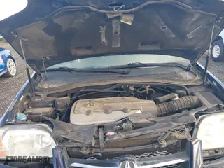 2003 Acura MDX with VIN 2HNYD18293H543120, listed as a IAAI auction lot 41697196 with 150,047 mi miles. Bid and sale history available at carsss.com. Image 10.