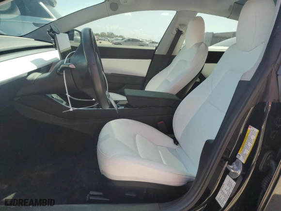 2019 Tesla Model 3 Long Range with VIN 5YJ3E1EB8KF391286, listed as a Copart auction lot 52175035 with 25,384 mi miles and Salvage Title. Bid and sale history available at carsss.com. Image 7.
