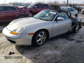1999 Porsche Boxster z VIN WP0CA2983XU629236, wystawiony jako Copart lot #88260825 z przebiegiem Nie podano mil oraz Nie do naprawy • Non repairable. Historia ofert i sprzedaży dostępna na DreamBid. Obrazek 1.