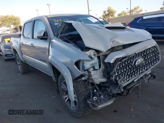 2019 Toyota Tacoma SR with VIN 3TMCZ5AN4KM214015, listed as a IAAI auction lot 42630709 with 69,004 mi miles and . Bid and sale history available at DreamBid. Image 1.