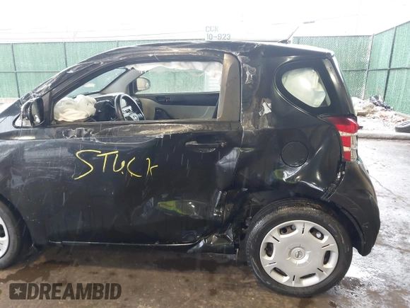 2013 Scion iQ with VIN JTNJJXB08DJ024825, listed as a IAAI auction lot 41842818 with 91,136 mi miles and . Bid and sale history available at DreamBid. Image 6.